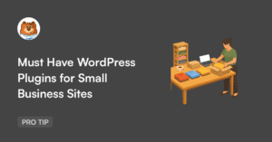 Hero image for an article: title 'Must Have WordPress Plugins for Small Business Sites' with a bear mascot badge on the left and a person at a packing desk with a laptop on the right on a dark background.