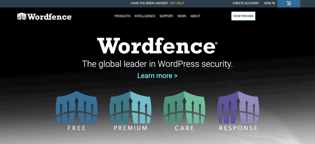 Hero di Wordfence con grande testo bianco del brand su un gradiente nero, sottotitolo 'Il leader globale nella sicurezza WordPress' e quattro scudi colorati etichettati GRATUITO, PREMIUM, ASSISTENZA, RISPOSTA come opzioni di piano.