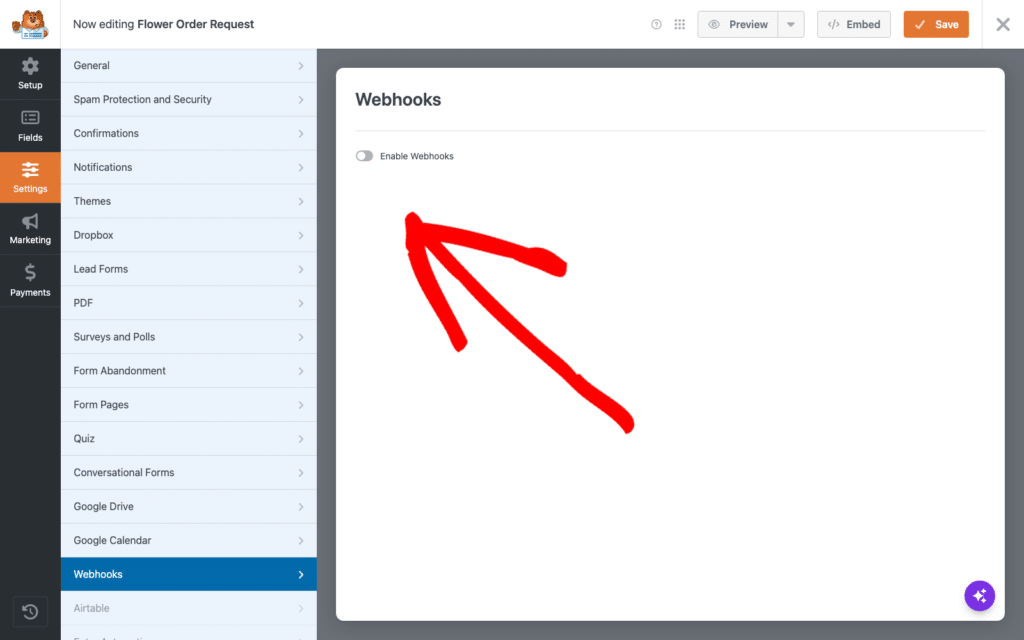Capture d'écran de l'interface utilisateur d'une page Paramètres montrant la section Webhooks avec une bascule Activer les Webhooks et une grande flèche rouge griffonnée sur une toile blanche