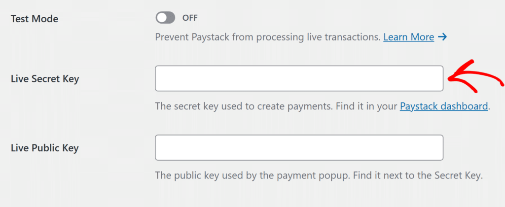 Settings form showing Paystack keys: Test Mode toggle OFF, with three input fields for Live Secret Key and Live Public Key and explanatory captions beneath each field.