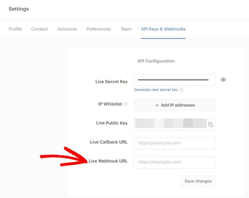 Settings page with API Keys & Webhooks tab; highlights the Live Webhook URL input field with an example URL.